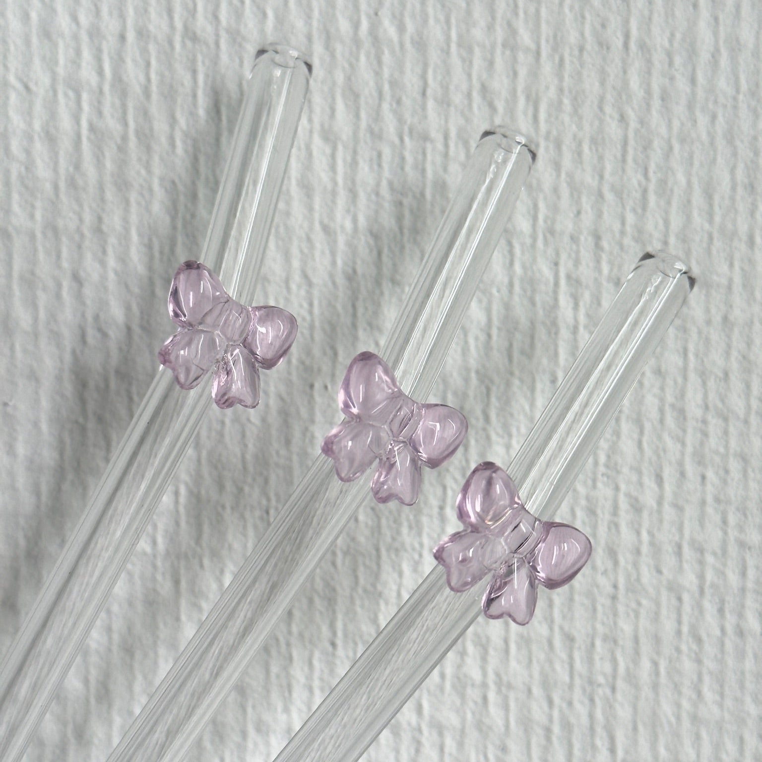 Herbruikbare glazen rietjes met strikje in verschillende kleuren – duurzaam en decoratief drinkaccessoire