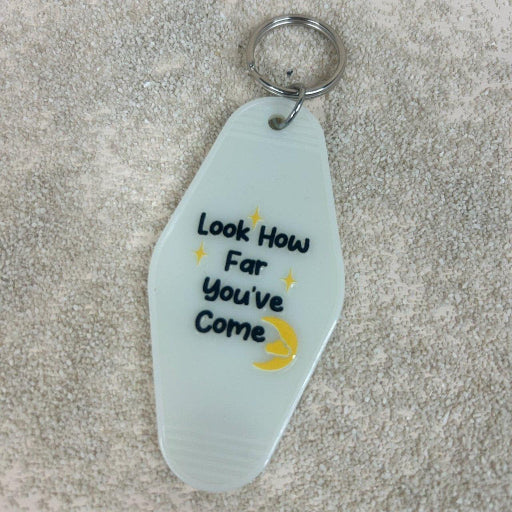 sleutelhanger-look-how-far- Belleza You